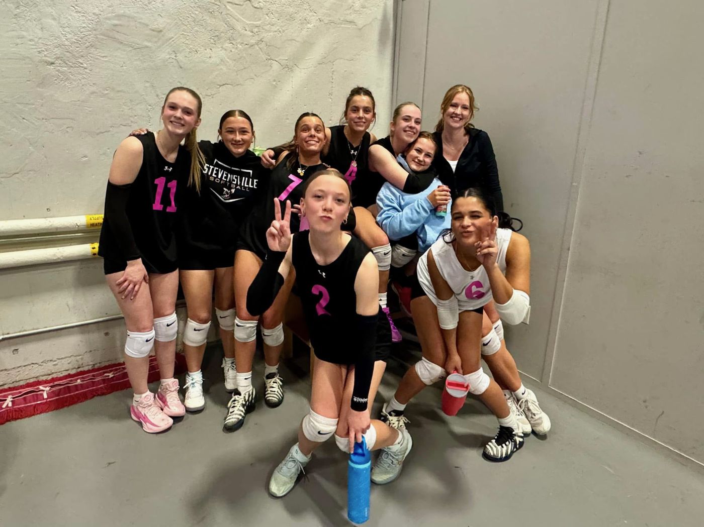 Players posing for a fun team photo